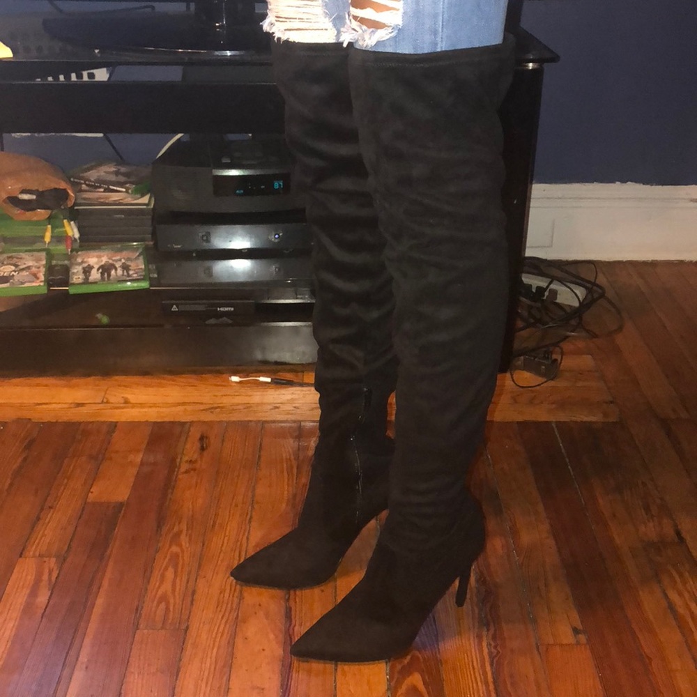 High knee boots.